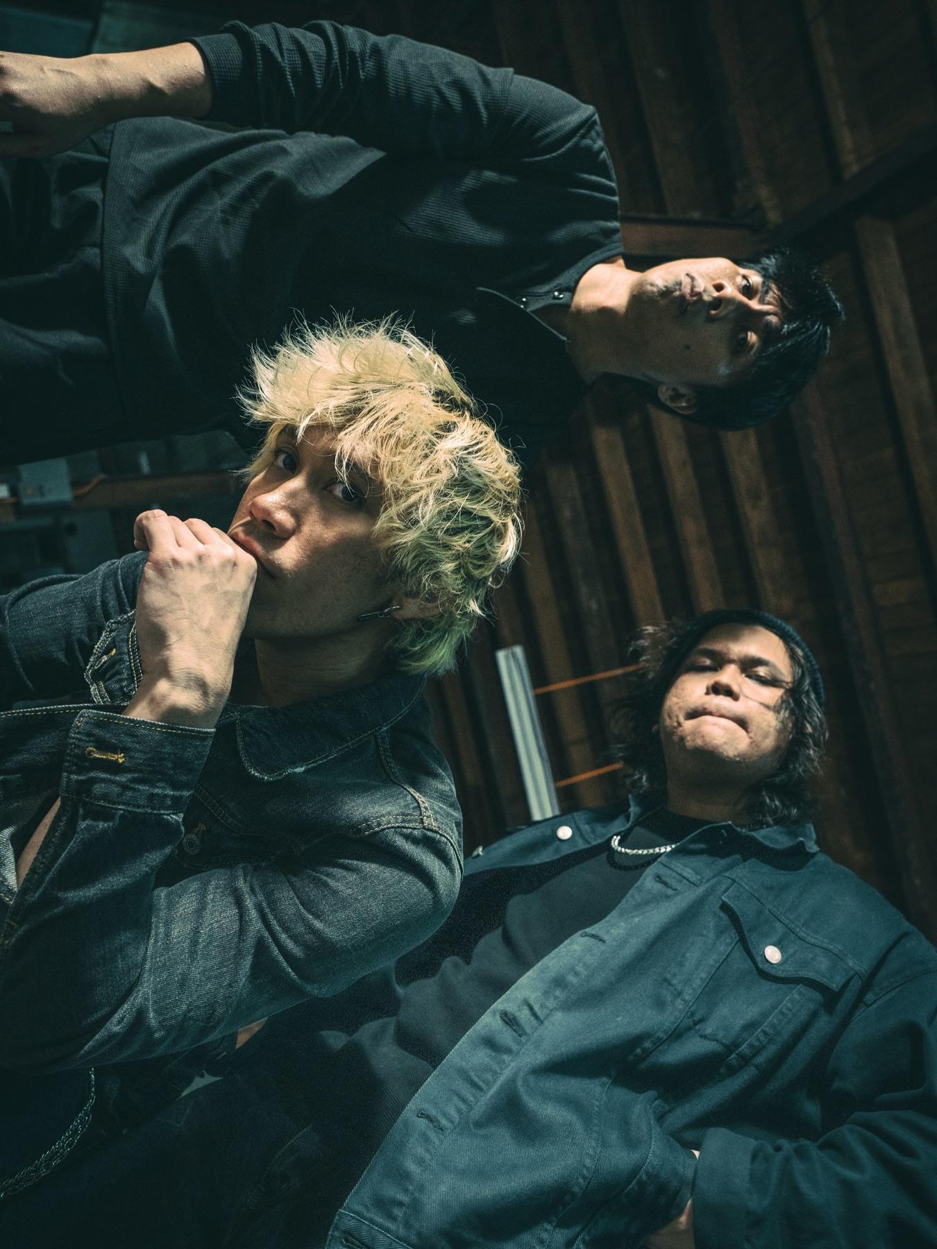 Empty Page band members in a candid group portrait